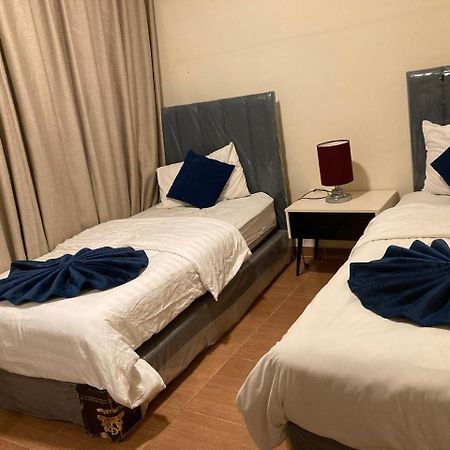 Uptown Hotel Apartment Amman Bagian luar foto