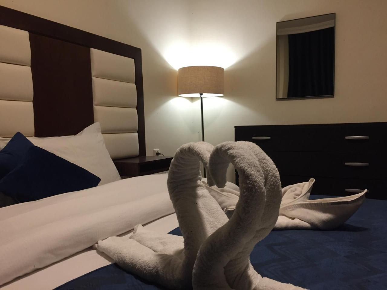 Uptown Hotel Apartment Amman Bagian luar foto