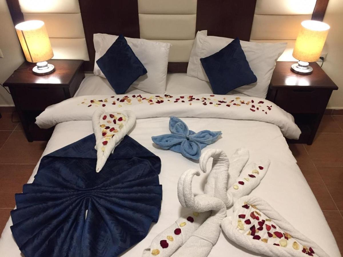 Uptown Hotel Apartment Amman Bagian luar foto