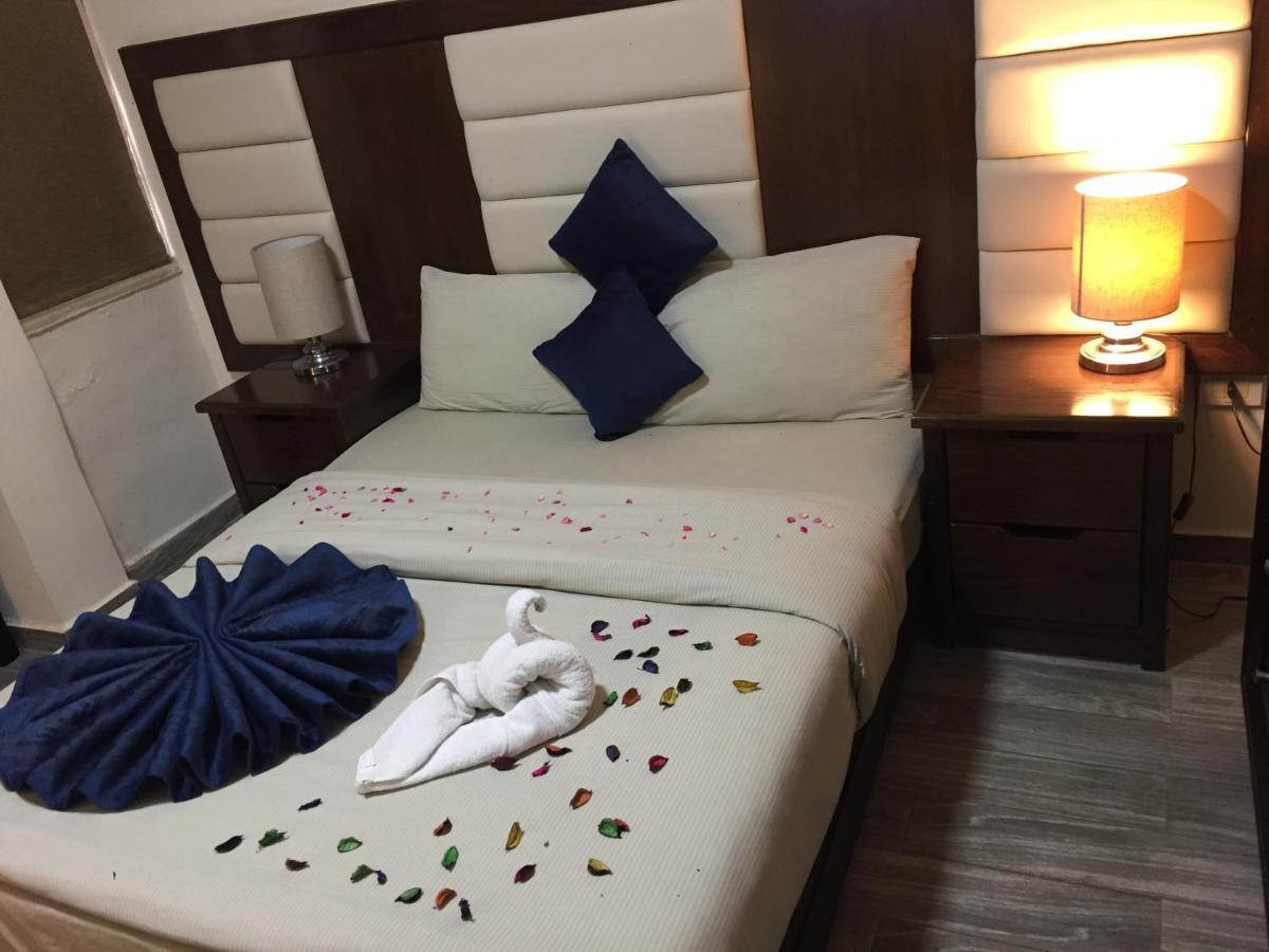 Uptown Hotel Apartment Amman Bagian luar foto